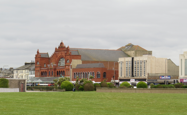 Large, ornate, red brick building